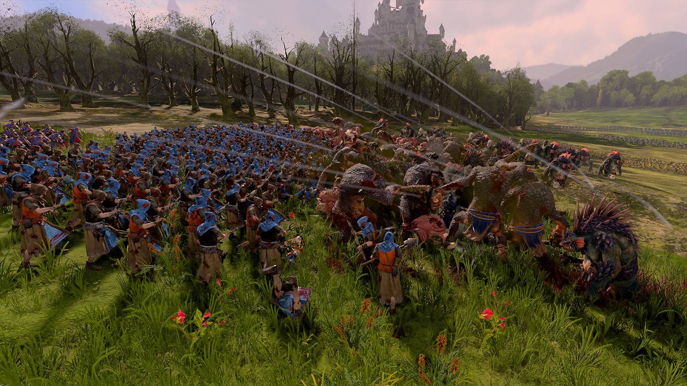 Peasants defend the bucolic fields of Bretonnia against trolls in Total War: Warhammer 3.